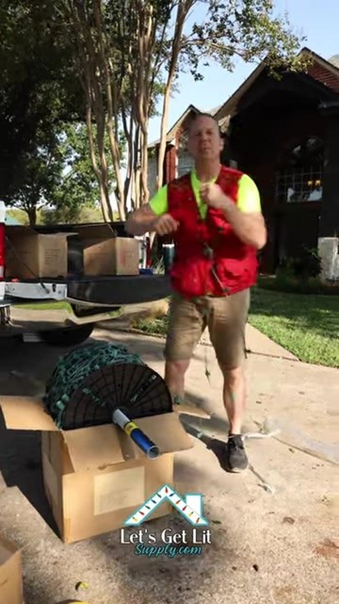 Still from "Christmas Lights Spool Trick"  -  Let's Get Lit Supply (YouTube). Truck-bed spool staging is the physical...