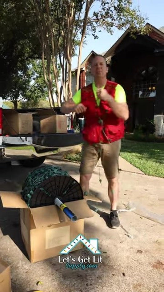 Still from "Christmas Lights Spool Trick"  -  Let's Get Lit Supply (YouTube). Truck-bed spool staging is the physical...